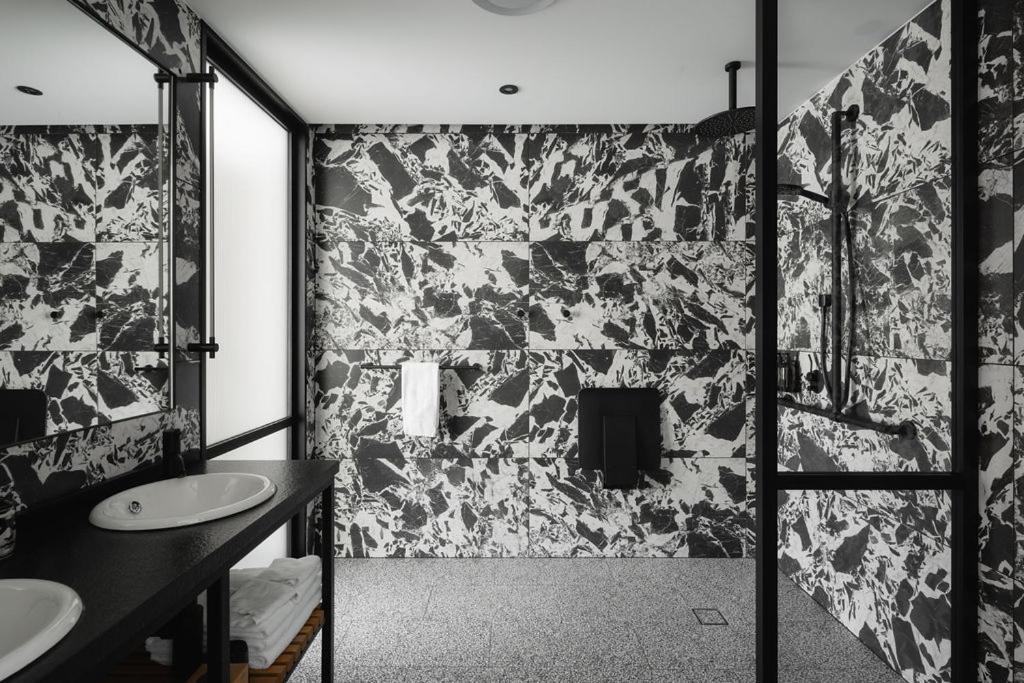 Ebb-Dunedin Esterno foto Bathroom with terrazzo tiles